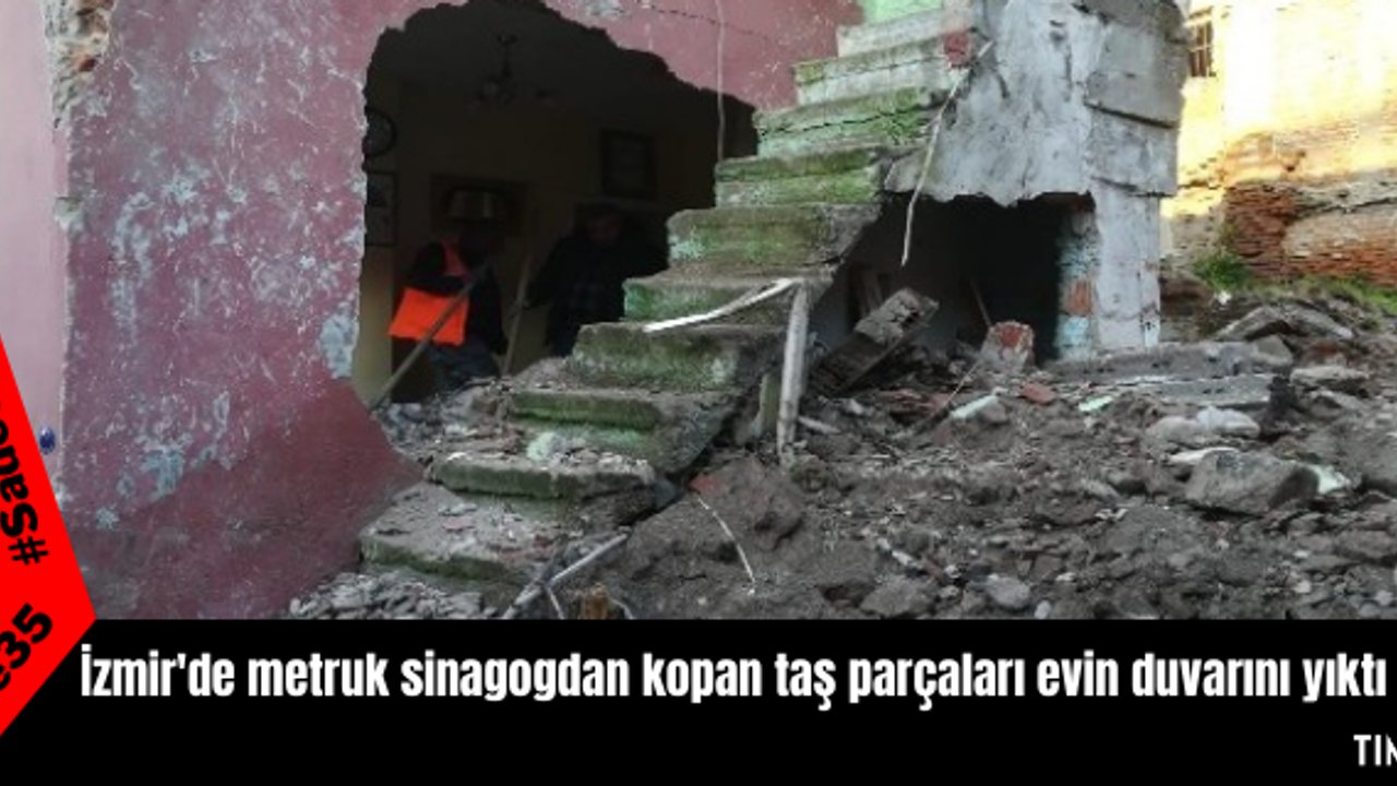İzmir'de metruk sinagogdan kopan taş parçaları evin duvarını yıktı