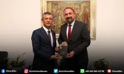 Gümrükçü'den Özel'e düğün davetiyesi