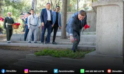 Başkan Tugay’dan şehitlerin kabrine karanfil