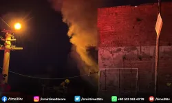 Güvercinleri için alevlerin arasında kaldı