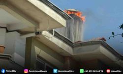 Apartman bacasında çıkan yangın paniğe neden oldu