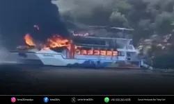 Gezi teknesinde yangın: 115 yolcu denize atladı