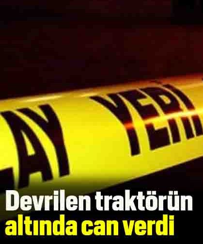 Devrilen traktörün altında can verdi