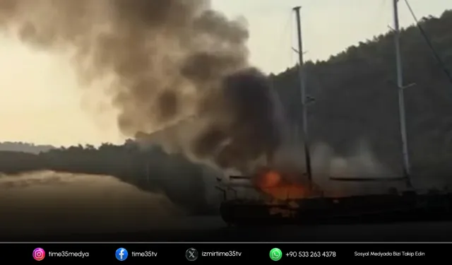 Alevlere teslim olan tekne denize gömüldü